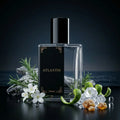 Perfume bottle labeled 'Atlantis' with floral and decorative elements on a dark background